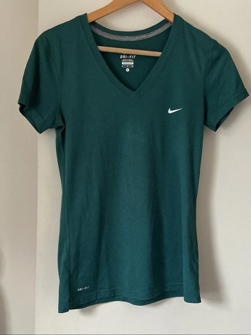 Nike Dri-FIT Women's V-Neck Tee in forest Green